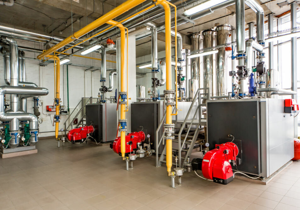 The interior of gas boiler, with three boilers.